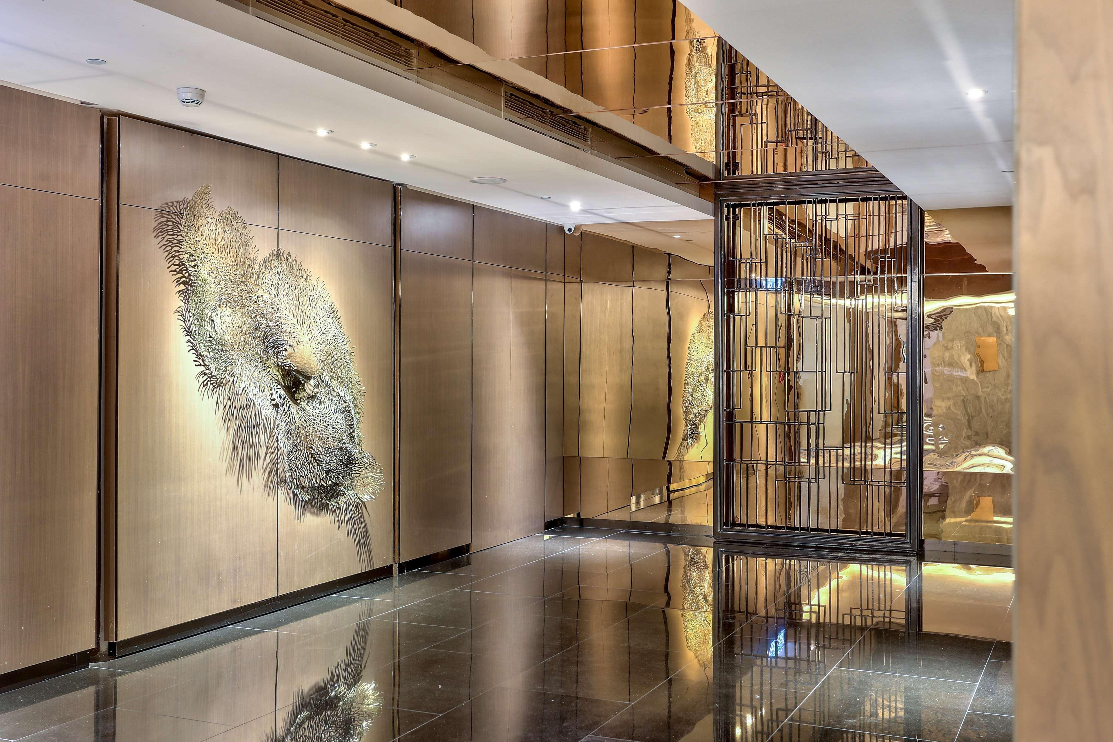 Готель Hilton Кота-Кінабалу Екстер'єр фото The lobby of the Ritz-Carlton, DIFC