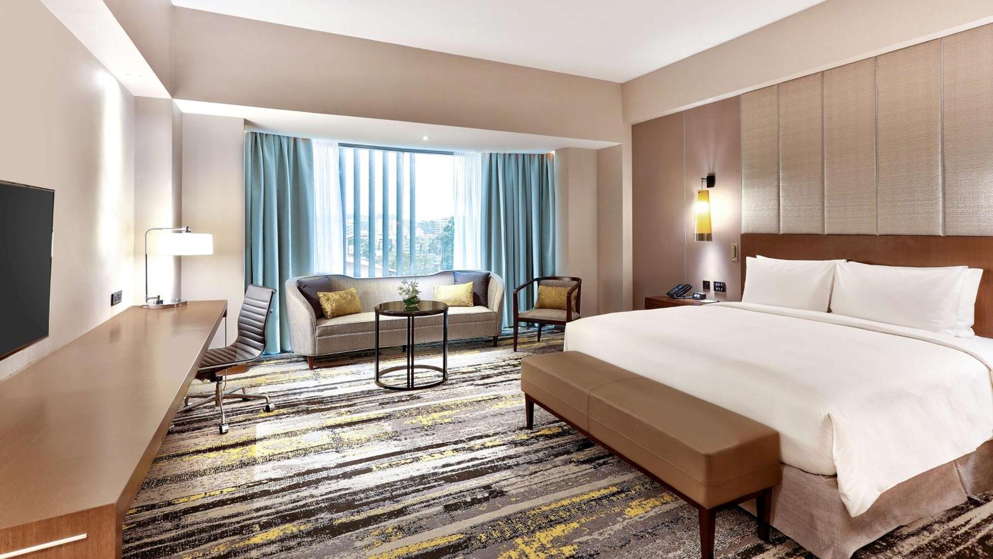 Готель Hilton Кота-Кінабалу Екстер'єр фото Deluxe Room